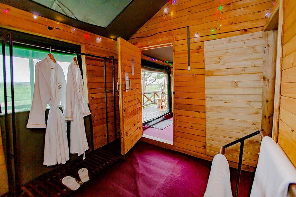 Guest room interior at Serengeti Heritage Luxury Tented Camp